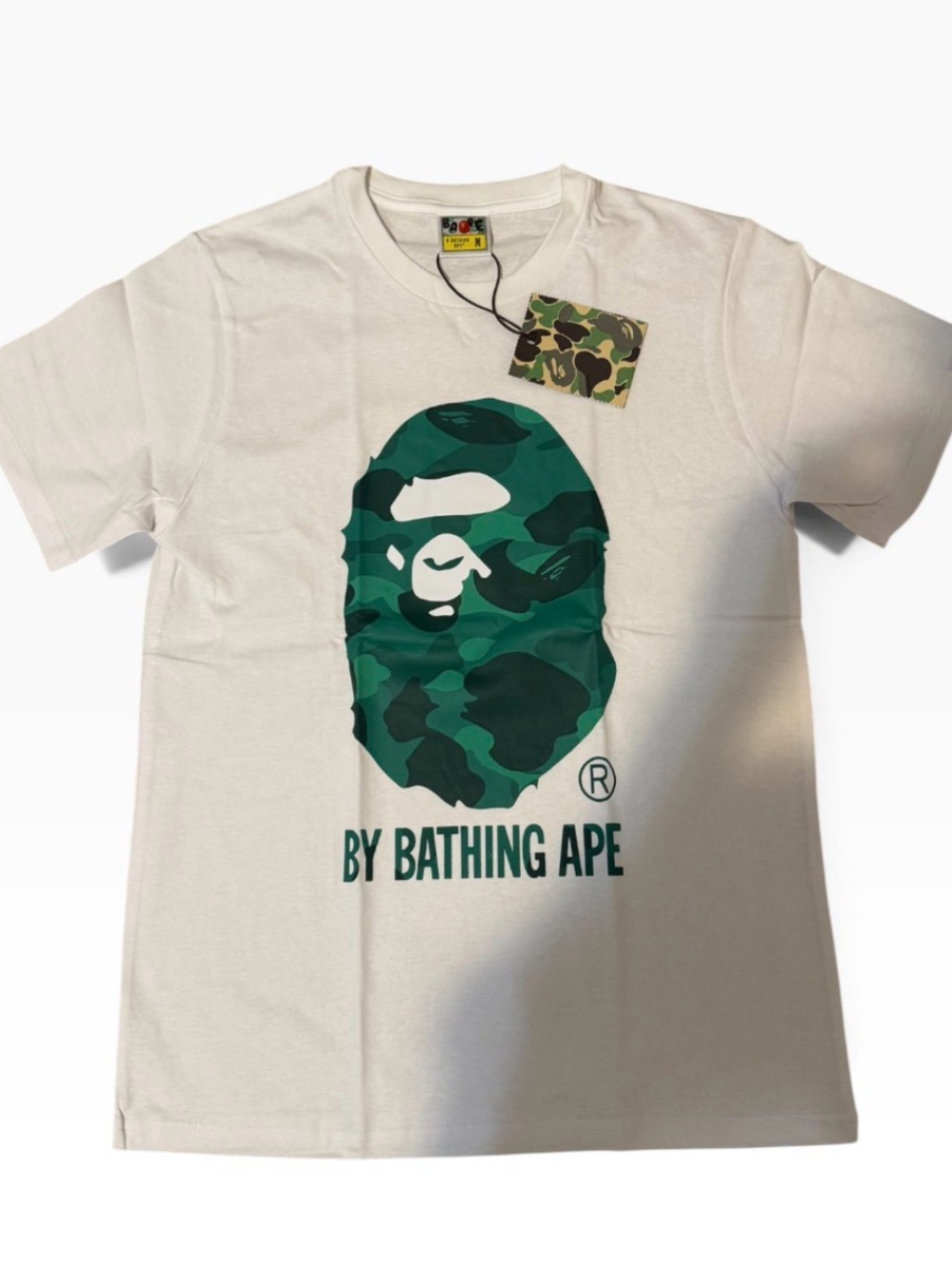 Bape White Tee with Dark Green Camo Ape Head Graphic